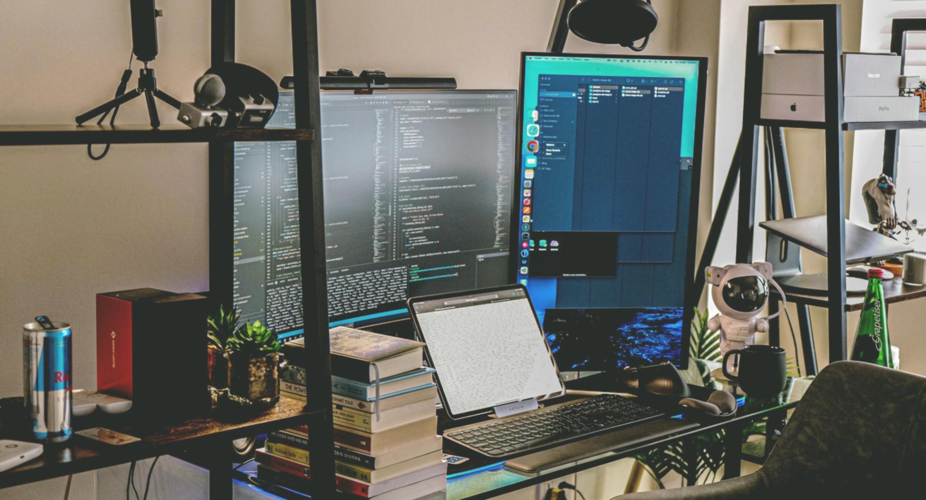 Developer working on JavaScript fundamentals at computer setup